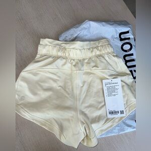 Lululemon Inner Glow HR Short 3” in Sundance yellow. Size 2.